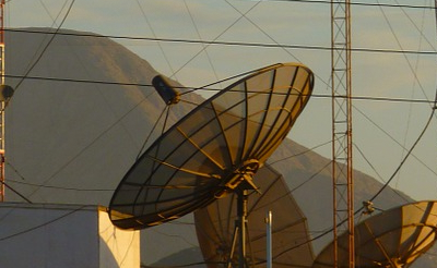 Antenna Communication Satellite Dish And House Roof